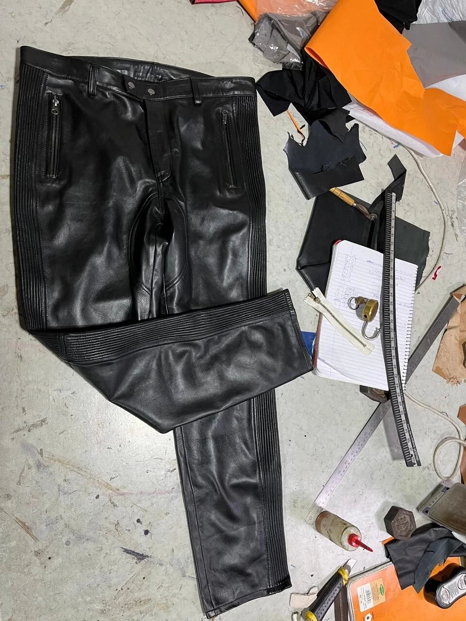 Pair of 2 men's black, brown quilted biker leather pants. Pants made of real soft sheepskin leather.